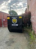 Business Front Load Dumpster Rental Services active delivery in Central NC